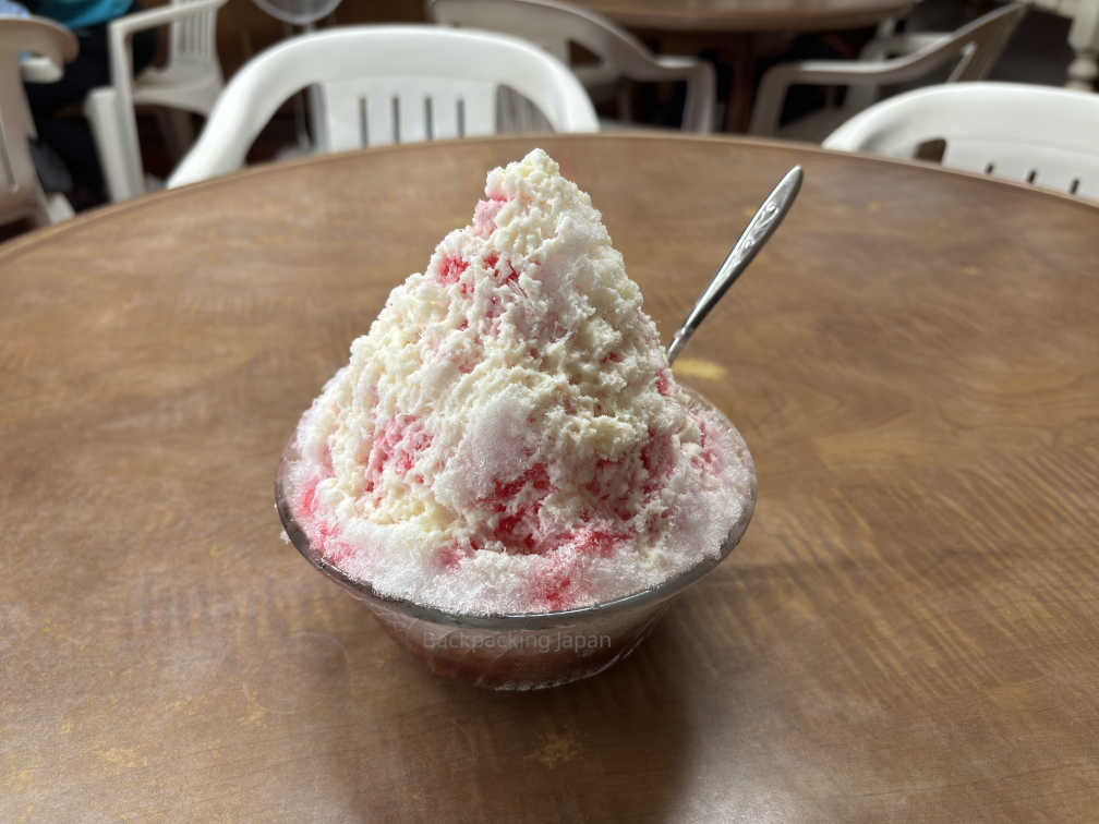 Okinawa senzai, a dessert of shaved ice on top of beans. This one had added toppings of strawberry sauce and some sort of sweet milk